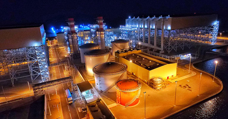 Photograph of an energy station taken at night